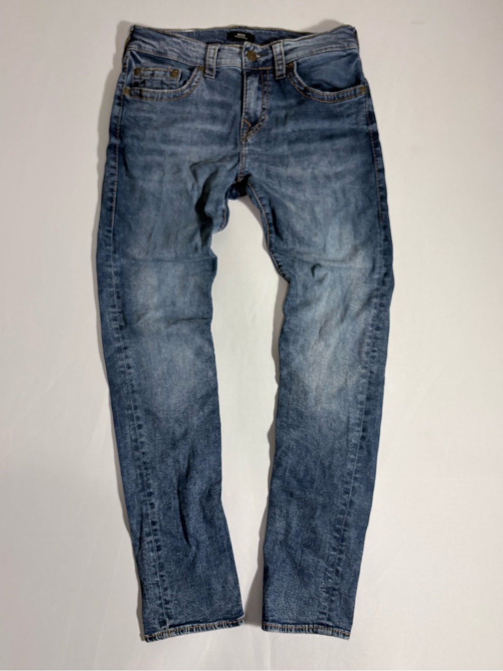 Men's Slim Fit True Religion dark blue denim.